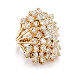A 14 Karat Yellow Gold and Diamond Cluster Ring, 13.60 dwts.