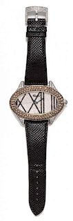 An 18 Karat White Gold, Diamond and Colored Diamond Wristwatch, Chopard,