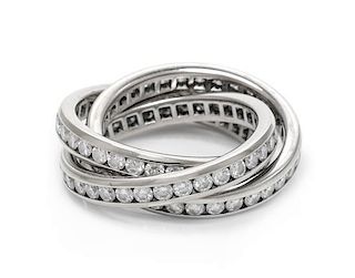 A 14 Karat White Gold and Diamond Triple Rolling Ring, 4.90 dwts.