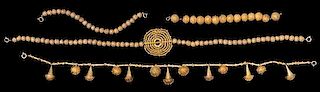 * A Collection of Akan Metal Alloy Jewelry, CÃ™te d'Ivoire/Ghana, consisting of two bracelets strung with numerous texture