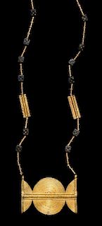 * An Akan Metal Alloy and Glass Dice Bead Pendant/Necklace, CÃ™te d'Ivoire/Ghana, strung with 12 glass dice beads, numerou