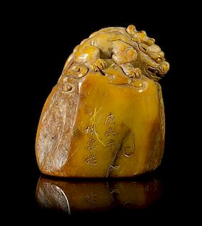 A Chinese Carved Hardstone Seal Stamp, Height 2 3/4 inches.