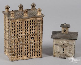 Two cast iron still bank buildings