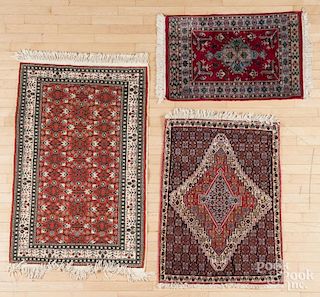 Three contemporary oriental mats