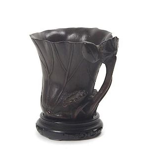 A Chinese Carved Bamboo Cup, Height 5 inches.