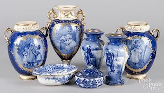 Five flow blue vases