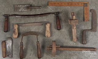 Group of iron and wood tools.