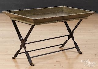 Embossed brass tray table with iron base