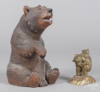 Carved wood bear, together with bronze bears