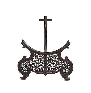 A Chinese Pierce Carved Hardwood Stand, Height 9 1/4 inches.
