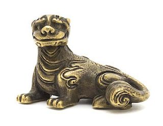 A Chinese Gilt Bronze Paperweight, Width 2 1/4 inches.