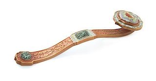 A Gilt and Polychrome Decorated Porcelain Ruyi Scepter, Length 17 5/8 inches.