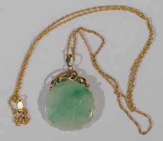 NO CREDIT CARDS FOR JEWELRY  14 karat gold chain with jade pendant.  length 20 inches  pendant diameter 3/4 inch  total weig.