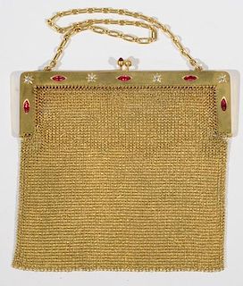 NO CREDIT CARDS FOR JEWELRY  14 karat gold mesh evening bag mounted with four diamonds, five rubies, and link chain, marked w
