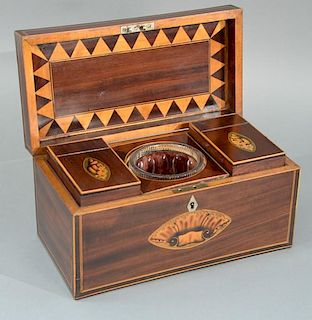 Mahogany tea box with inlaid conch shells and lines. 
height 6 inches, width 12 inches, depth 6 inches