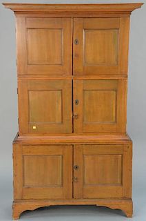 Chippendale cupboard / cabinet in three parts, upper two portions each having two doors opening to reveal pidgeon holes, set