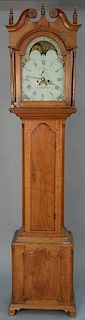 Griffith Owen walnut tall case clock having broken arch top over tombstone door over arch door flanked by fluted columns, all