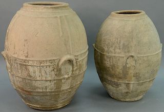 Two large earthenware urns, each with built in handles and larger is marked: RR 1831 (one with chip, crack, and piece missing