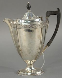 English silver teapot with wood handle.   height 9 1/2 inches, 17.4 troy ounces   Provenance: The Estate of Thomas F Hodgman.