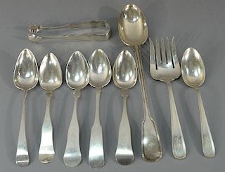 Nine piece silver and coin silver lot to include large stuffing spoon and tongs. 
21.4 troy ounces 
Provenance: 
From the Est