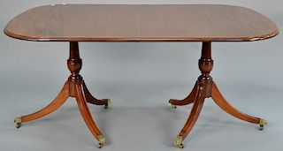 Margolis mahogany double pedestal dining table with line inlaid top having three leaves, branded: Margolis Shops.   height 29