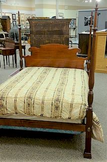 Margolis mahogany double size four post bed having tall fluted and carved posts and flame finials.   width 60 inches, head to