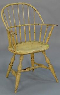 Windsor sack back armchair having saddle seat set on bold turned legs with H stretcher.   total height 38 inches, seat height
