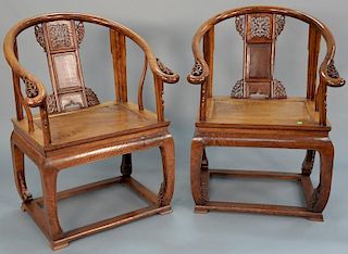 Pair of Chinese hardwood yoke back armchairs with burlwood seats. 
height 38 inches, width 27 inches
