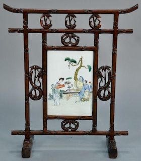 Chinese fire screen, faux bamboo with center porcelain panel, early 20th century.   height 32 1/2 inches, width 27 1/2 inches