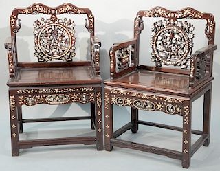 Pair of Chinese hardwood armchairs with inlaid mother of pearl, all on square legs. 
height 38 inches