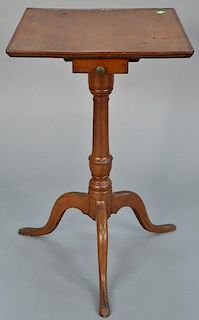 Federal cherry candle stand having a dished square top over drawer on vase turned shaft, set on tripod base. 
height 26 inche
