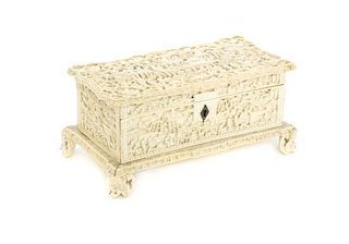 A Chinese Export Carved Ivory Table Casket, Height 3 3/8 x width 7 1/4 x depth 3 3/4 inches.
