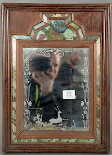 Courting mirror with etched deer and floral designs surrounded by reverse painted glass (cracks). 
17" x 12 1/4"