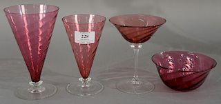 Twenty-four piece lot of crystal stems with cranberry swirl in four sizes plus finger bowls.   stems: height 5 3/4 inches  bo