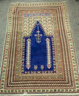 Oriental throw rug. 
3'9" x 5'9"