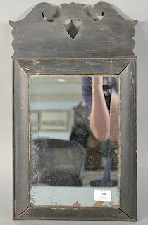 Queen Anne mirror with heart carved top over plain frame and beveled glass (possible restoration to top).   height 20 3/4 inc