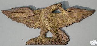 Iron eagle with banner and spread wings, traces of old gilt letters in banner (one wing with old repair).   height 10 1/4 inc