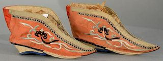 Pair of Chinese embroidered silk lotus shoes, late 19th/early 20th century. 
height 3 inches, length 6 1/2 inches