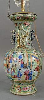 Famille rose porcelain vase with underglaze celadon base having two painted panels with scholar figures and molded dragons on