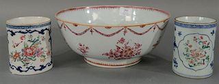 Three piece Chinese export lot to include a bowl with footed base and two mugs (bowl with two cracks). 
diameter 11 1/4 inche