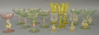 Group of fourteen Venetian glass stems to include set of five green pink and clear glass with gilt flecking and nine having d