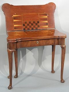 George I mahogany gaming table with turret corners with three tops having inlaid game board, inner top has felt top with scoo