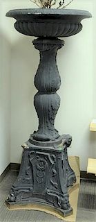 Pair of iron one part urns (minor imperfections).  height 71 inches, ciameter 31 1/2 inches  Provenance: Property from the