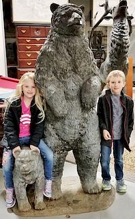 Bronze bear figure standing with bear cub, life size.   height 72 inches, width 45 inches