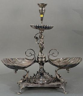 Victorian silverplate figural epergne (base has bend). 
height 26 inches, width 24 inches 
Provenance: 
From the Estate of Fa