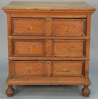 William and Mary pine three drawer chest on ball feet, late 17th century. 
height 40 inches, width 35 1/2 inches 
Provenance: