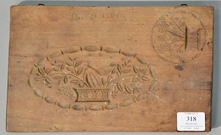 Hardwood two sided cake board, one side with oval basket of flowers and bird, other side with same but deeper, plus round wit