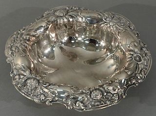 Gorham sterling silver bowl with floral repousse top edge.   height 2 3/4 inches, diameter 12 inches  18.5 troy ounces  Prov.