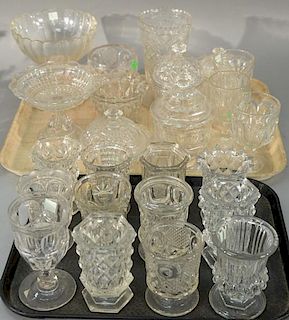 Twenty-four piece lot of flint glass including compotes, stemmed goblets, and covered dishes.   heights 4 inches to 7 1/2 inc