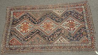 Oriental throw rug (wear). 
4'8" x 7'6"